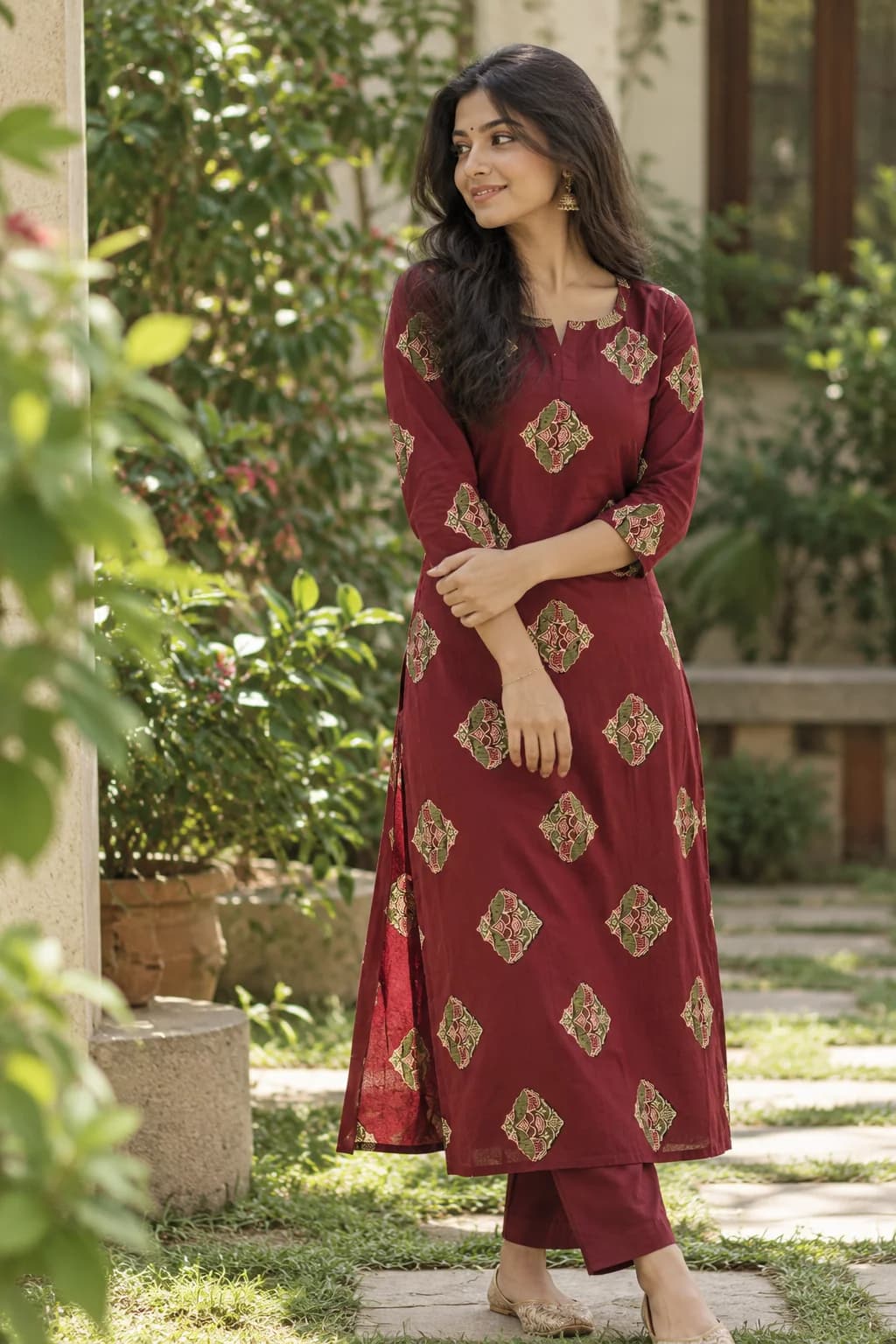 Maroon kurta set with gold motifs
